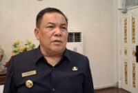 1762429664563-gubernur-riau-sf-hariyanto-raja-adil-siregardetikcom_169