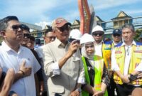 1762601944606-keterangan-foto-menteri-pu-dody-hanggodo-saat-meninjau-bendung-sei-wampu-di-kabupaten-langkat-nizar-aldidetiksumut-1762594187355_169