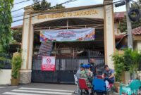 1762775442518-sman-72-kelapa-gading-jakarta-utara-masih-dijaga-pasca-ledakan-sabtu-8112025-pagi-1762571295492_169