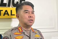 1763055759558-kabid-humas-polda-sumut-kombes-ferry-walintukan-saat-diwawancarai-finta-rahyunidetiksumut-1760682663704_169