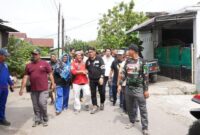1764587197620-psi-fokus-bersihkan-rumah-warga-dan-salurkan-bantuan-langsung-di-binjai-foto-dok-psi-1764577958982_169