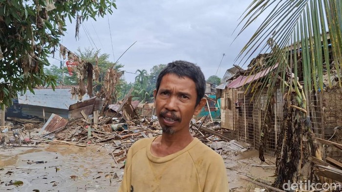 1765343194521-muhammad-fahmi-korban-banjir-bandang-di-desa-kota-lintang-bawah-kecamatan-kuala-simpang-kabupaten-aceh-tamiang-aceh-nizar-aldi-1765334042205_169