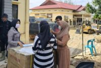 1765386351010-polres-aceh-tamiang-tetap-layani-laporan-warga-meski-masih-berlumpur-foto-polres-aceh-tamiang-1765376466827_169