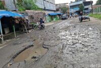 1765451161498-jalan-rusak-di-binjai-1765438781985_169