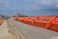 1765451170016-keterangan-foto-tenda-bnpb-berjejer-rapi-di-atas-jembatan-sungai-tamiang-markus-gamaliel-situmorangdetiksumut-1765427037130_169