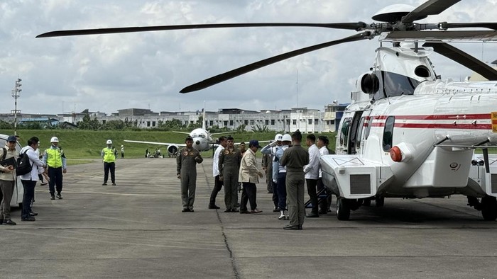 1765623913240-presiden-prabowo-subianto-melanjutkan-agenda-peninjauan-lokasi-bencana-ke-langkat-menggunakan-helikopter-dari-kota-medan-1765598528326_169