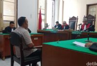 1765818407980-sidang-dakwaan-mantan-kades-aek-nabara-di-pengadilan-negeri-pn-medan-senin15122025-juitadetiksumut-1765802438205_169