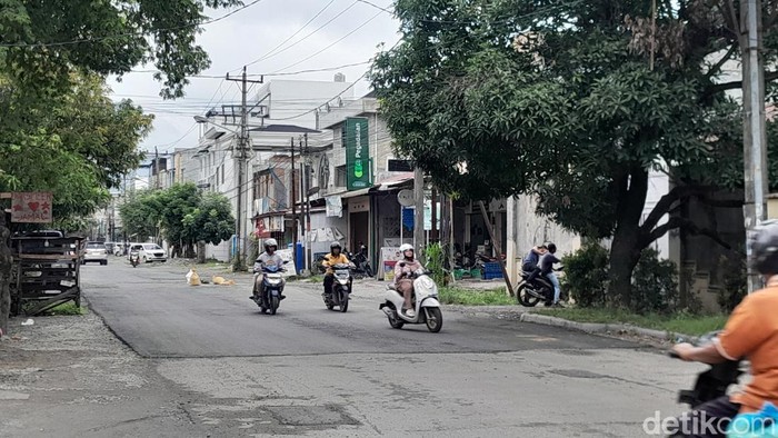 1765969566408-jalan-rusak-sudah-diperbaiki-1765956738381_169