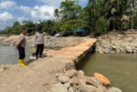 1769425585676-jembatan-darurat-di-desa-riseh-tunong-kecamatan-sawang-kabupaten-aceh-utara-dok-polres-lhokseumawe-1769407509931_169