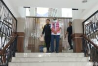 1769555125766-tersangka-ketika-dibawa-ke-rutan-tanjung-gusta-medan-foto-juita-sinuhajidetiksumut-1769519092045_169